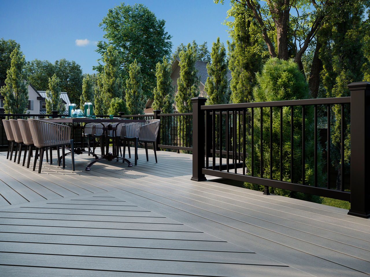 Deck in Trex Enhance color Tide Pool with deck furniture.